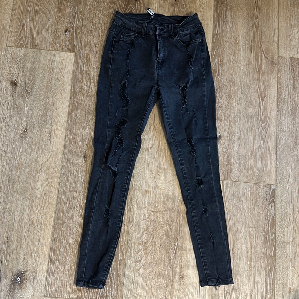 Black, distressed skinny jeans from fashion nova